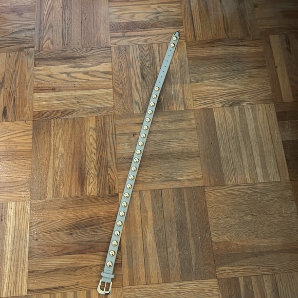 Gold stud belt revolve